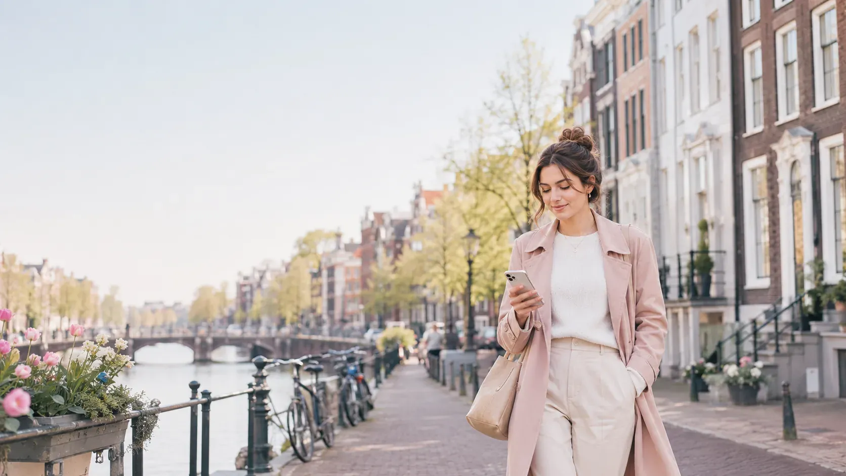A young expat walking past parked bikes along an Amsterdam canal, on her way to the bike repair shop.